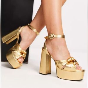 Gold platform heels